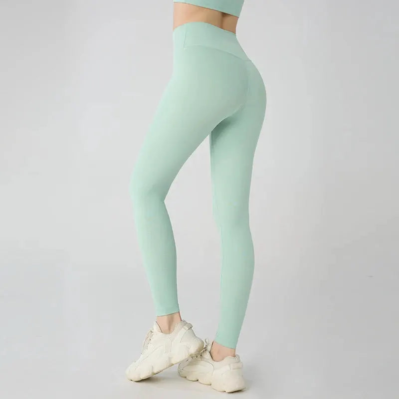 Simples Market mint green high-waisted yoga leggings for women, breathable hip-lifting fitness pants.