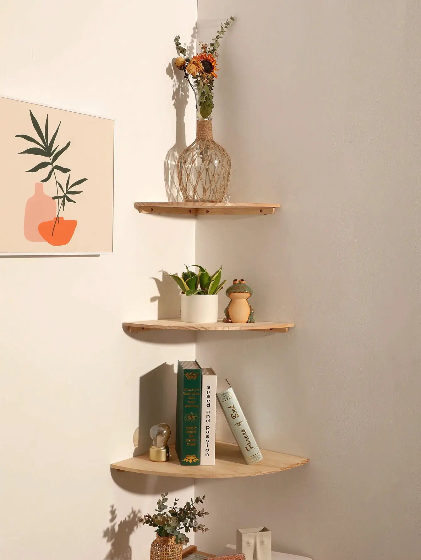 Natural wood wall corner shelves, 3-piece floating set with rounded ends, displaying vases and books.