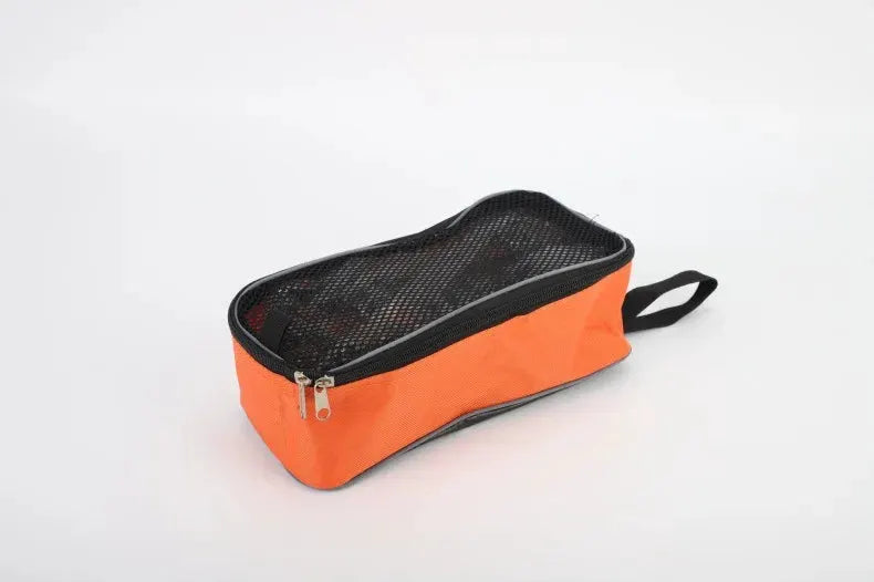12-tooth ice crampons in orange zip pouch with black mesh top