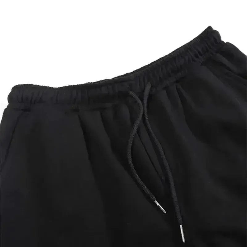 Cycling sweatpants, black with elastic waistband and drawstring