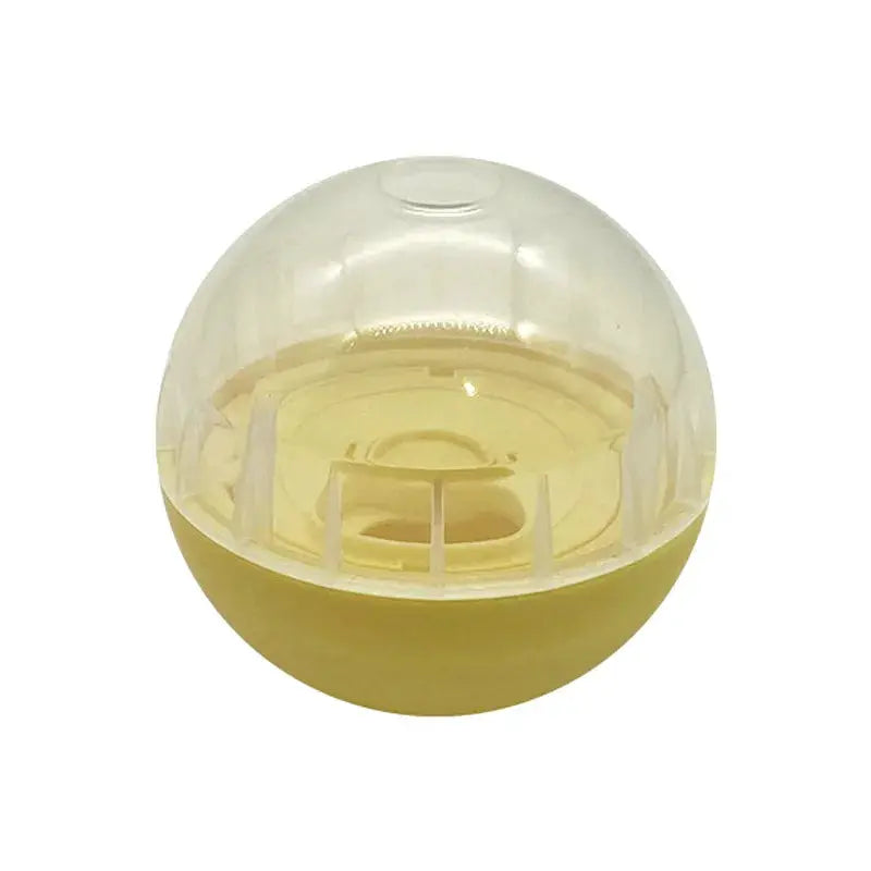 IQ Treat Ball dog treat dispenser toy by Simples Market, yellow base with transparent dome