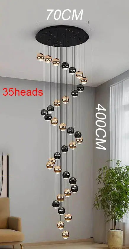 Pendant light by Simples Market: spiral design with 35 black and gold globe bulbs on long cords.