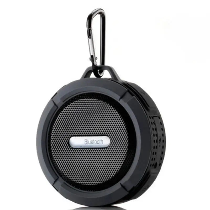 Waterproof wireless portable Bluetooth speaker, round black rugged design with carabiner
