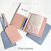 Custom name travel passport cover set with two pink and blue covers, luggage tag, card slots, and personalized initials