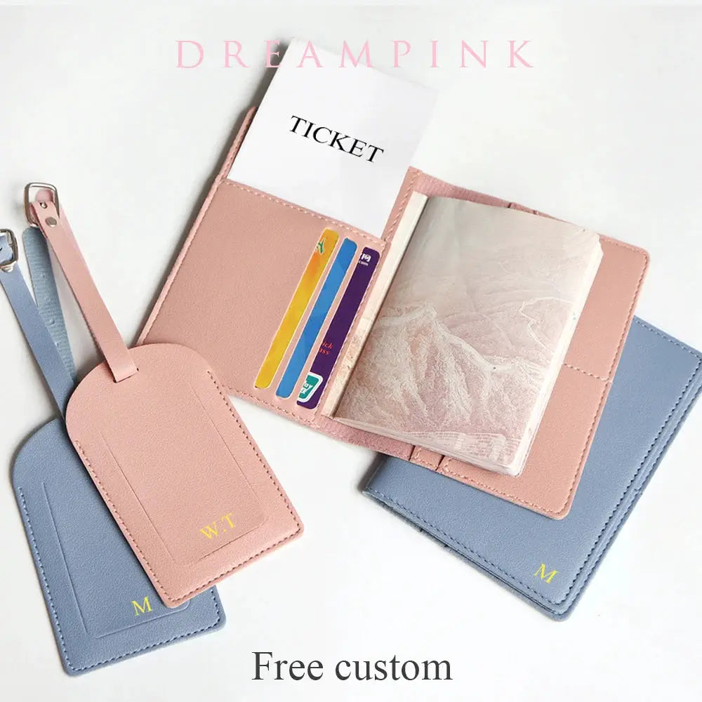Custom name travel passport cover set with two pink and blue covers, luggage tag, card slots, and personalized initials