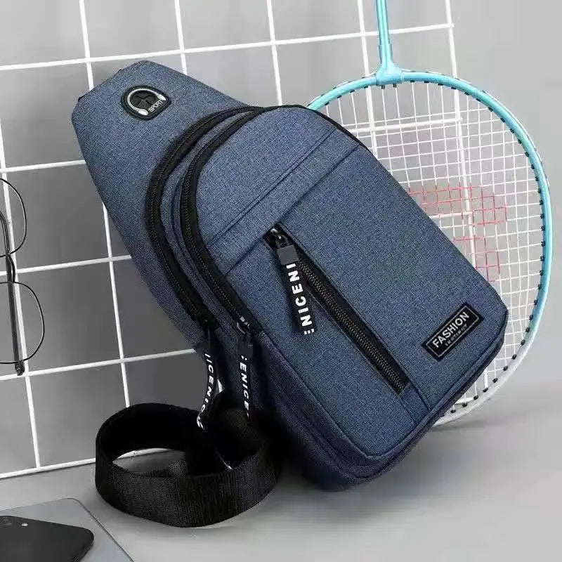 Chest bag by Simples Market in blue Oxford cloth, multifunctional crossbody with zipper pockets and adjustable strap