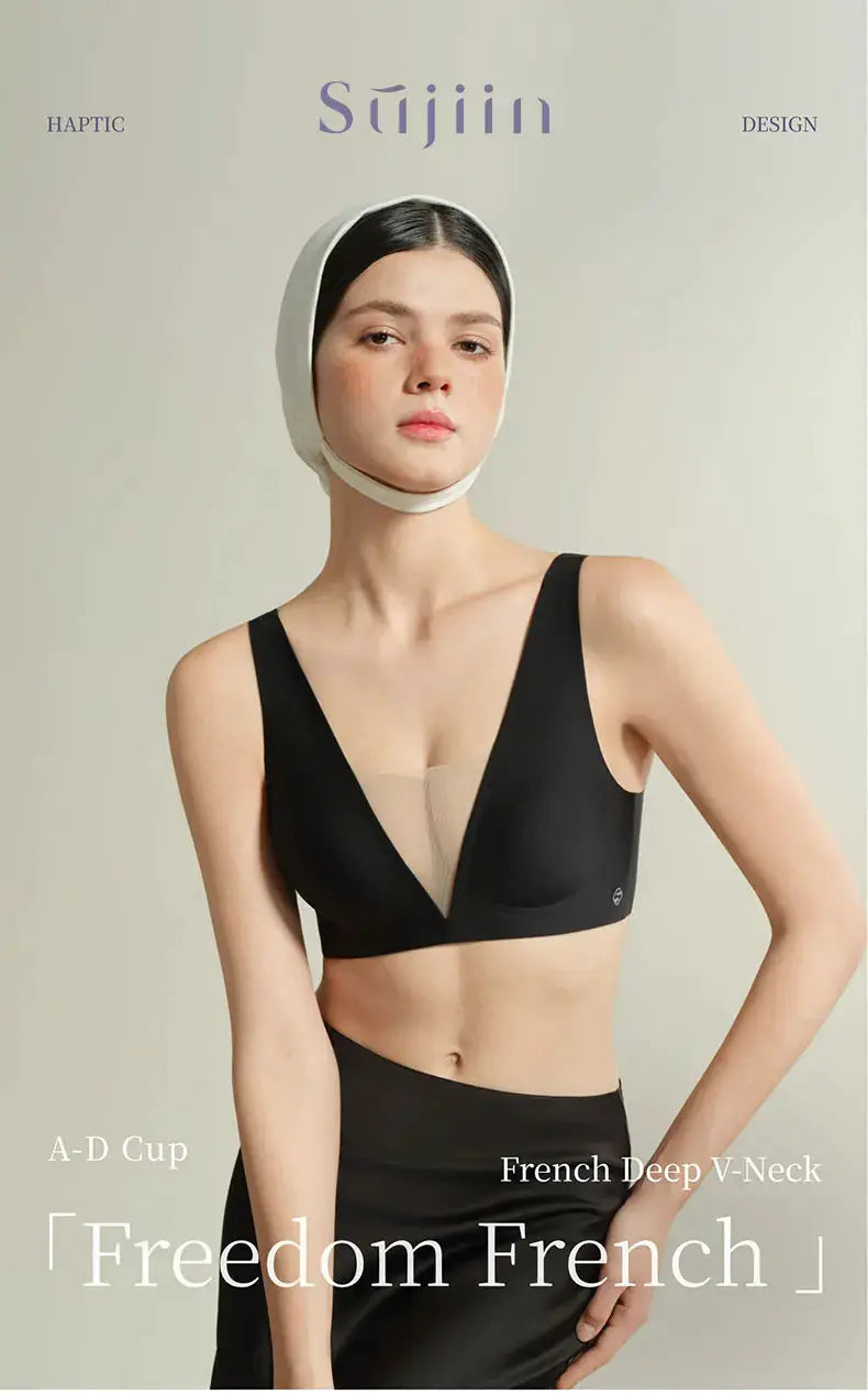 SUJIIN black seamless plunge bra with beige mesh center on model; wireless deep V-neck.