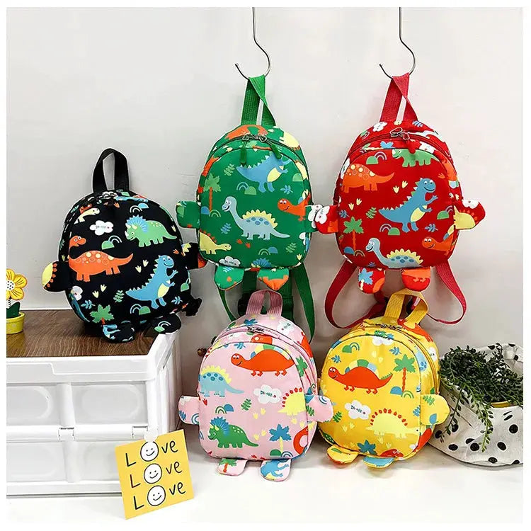 Simples Market kids dinosaur backpack set, five colorful anti-lost backpacks in black, green, red, pink and yellow.