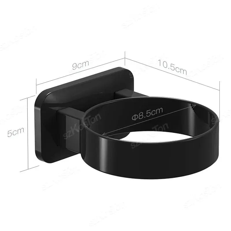 Adhesive wall-mounted hair dryer holder rack in black with circular ring for bathroom storage