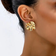 A Pair of Irregular Round Gold-Tone Hammered Metal Stud Earrings by Simples Market