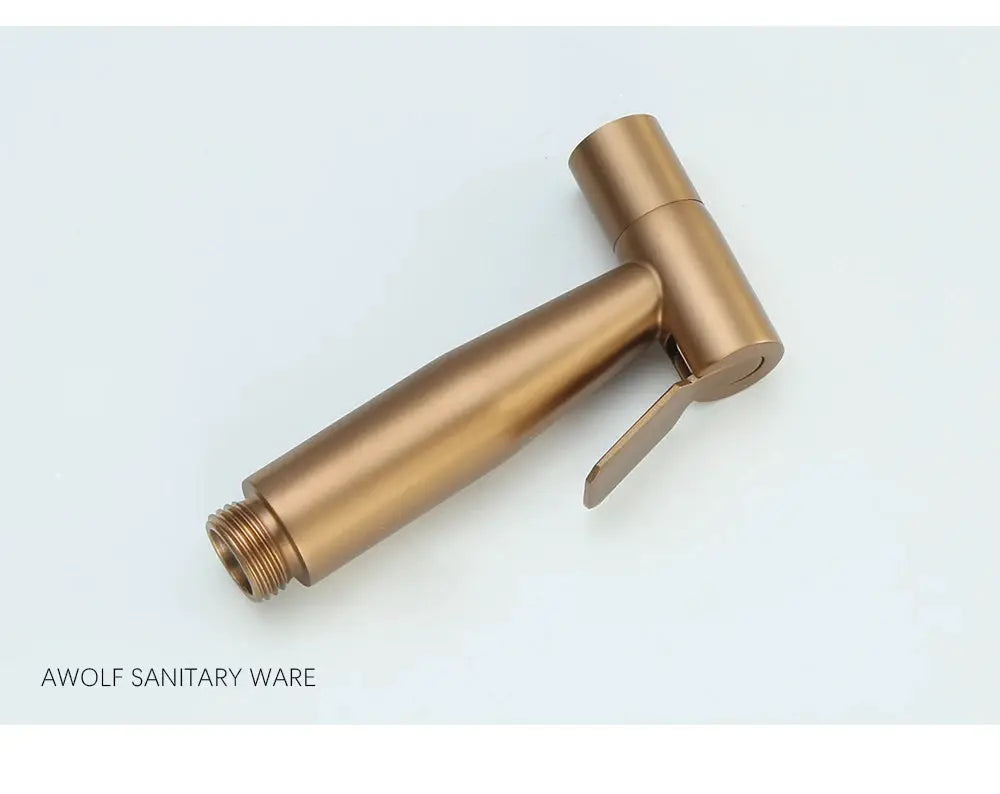Handheld toilet bidet sprayer head in brushed rose gold stainless steel with lever handle by Simples Market.