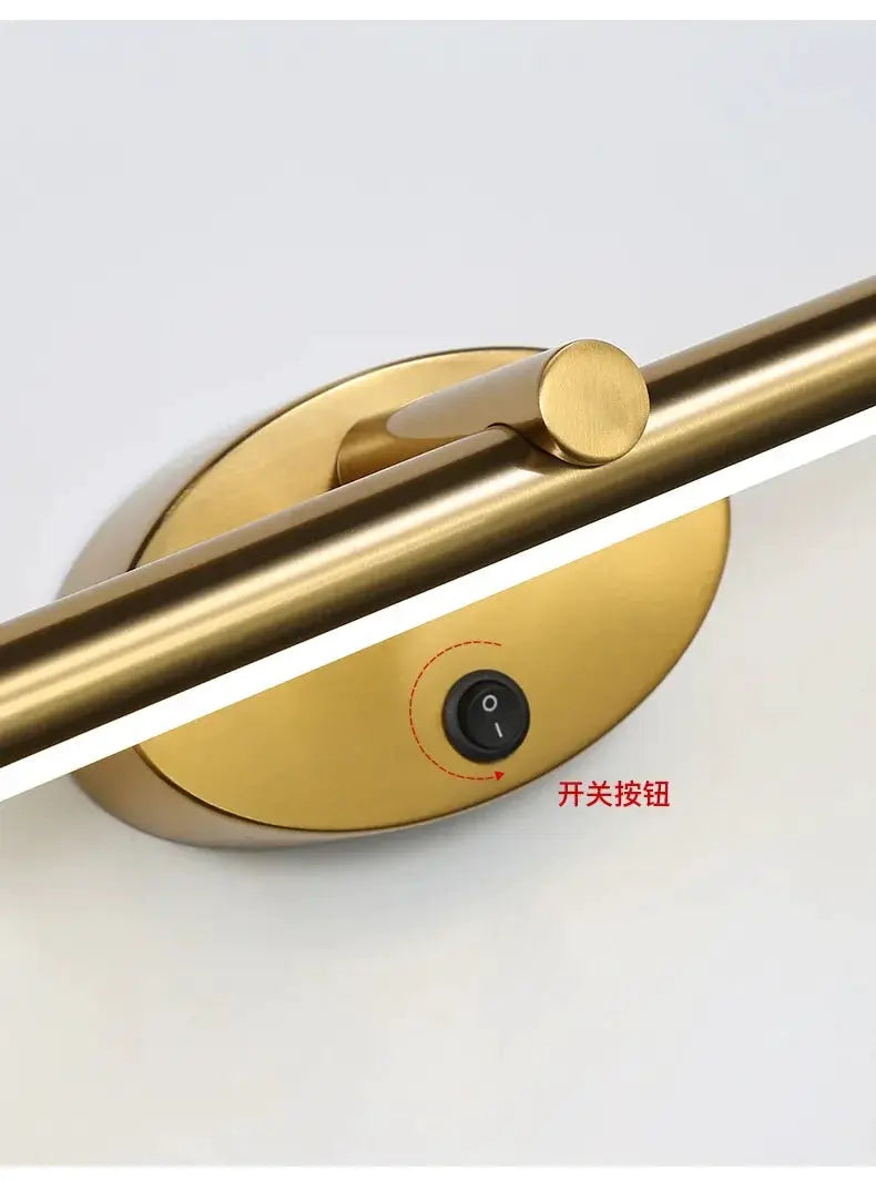 Modern LED indoor wall lamp by Simples Market in brushed gold with touch switch for bathroom mirror.