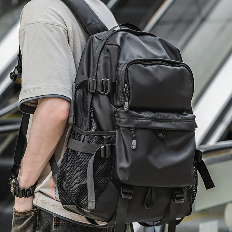 ZUOKEDISI 15.6-inch laptop travel backpack by Simples Market, black with multiple zip pockets and mesh side pocket