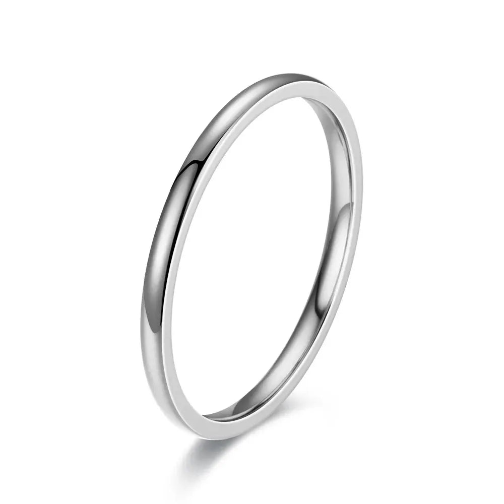 Unisex stainless steel ring with a polished silver finish; simple wedding band for men and women.