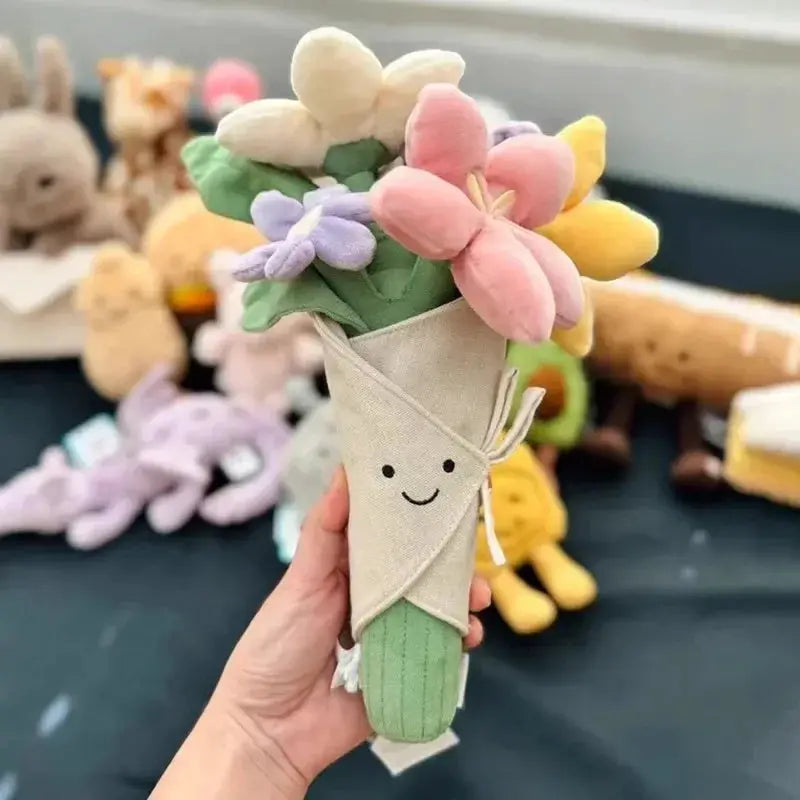 Plush flower bouquet by Simples Market; pastel fabric flowers in a beige wrap with a smiley face.