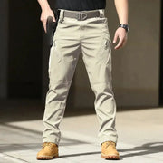 Simples Market men's tactical cargo pants, beige softshell with stretch, multiple cargo pockets, button fly.