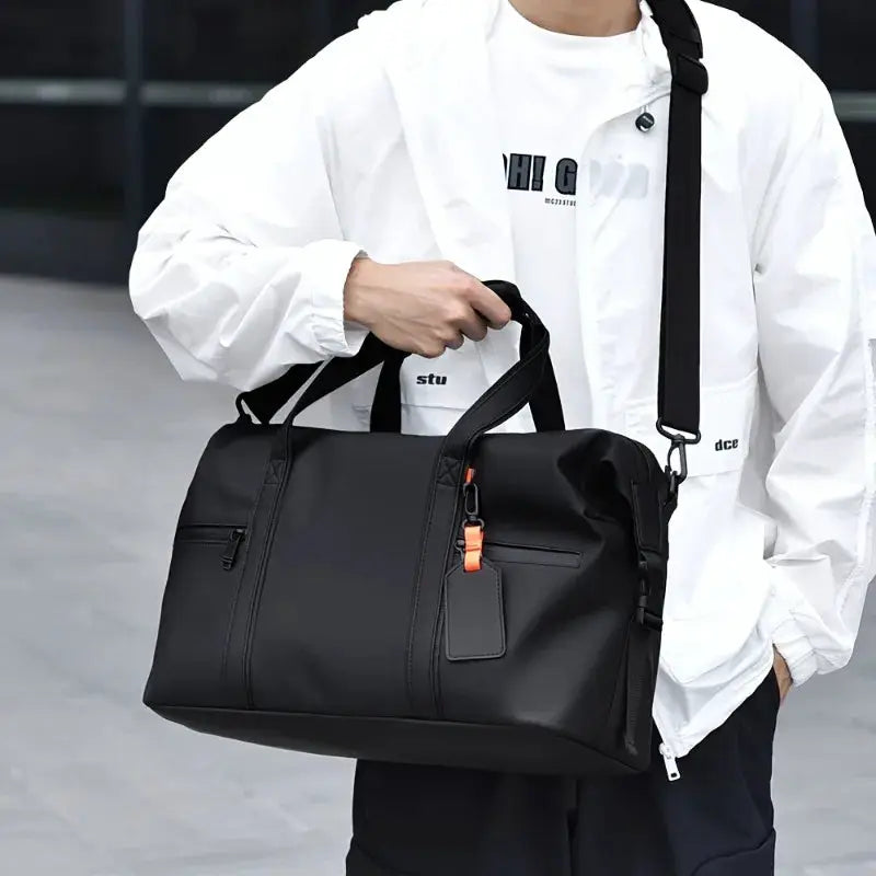 Simples Market large black travel duffel bag with dual top handles and removable shoulder strap