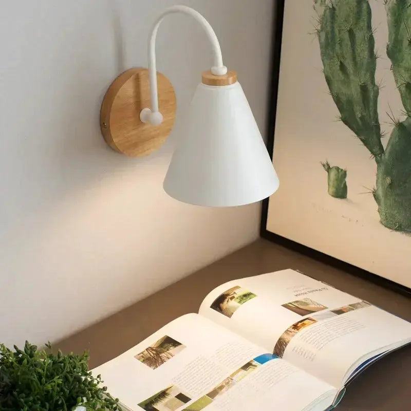 Nordic wall sconce with white conical shade and round wooden backplate