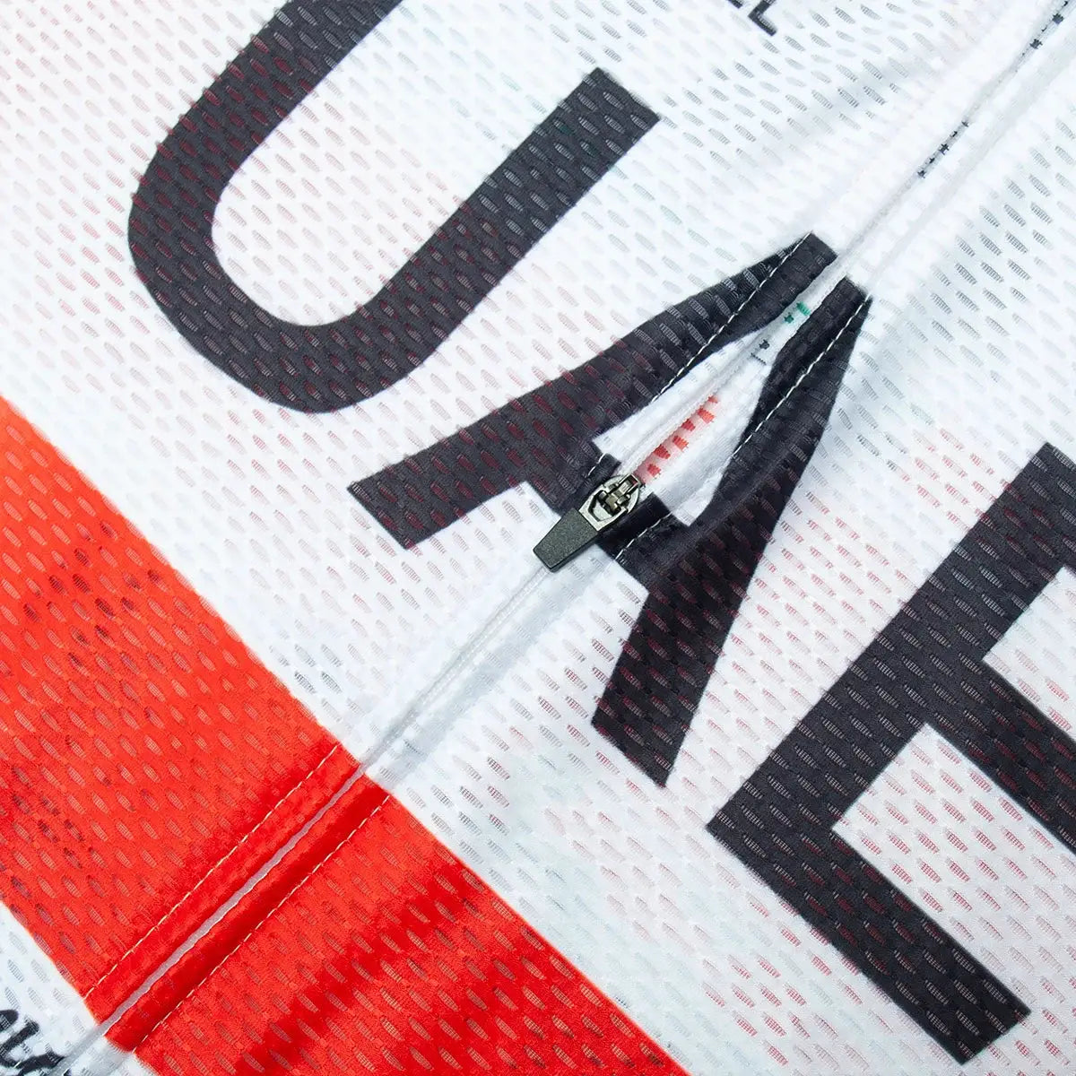 UAE cycling jersey set, white mesh fabric with red panels and bold black lettering, zip front