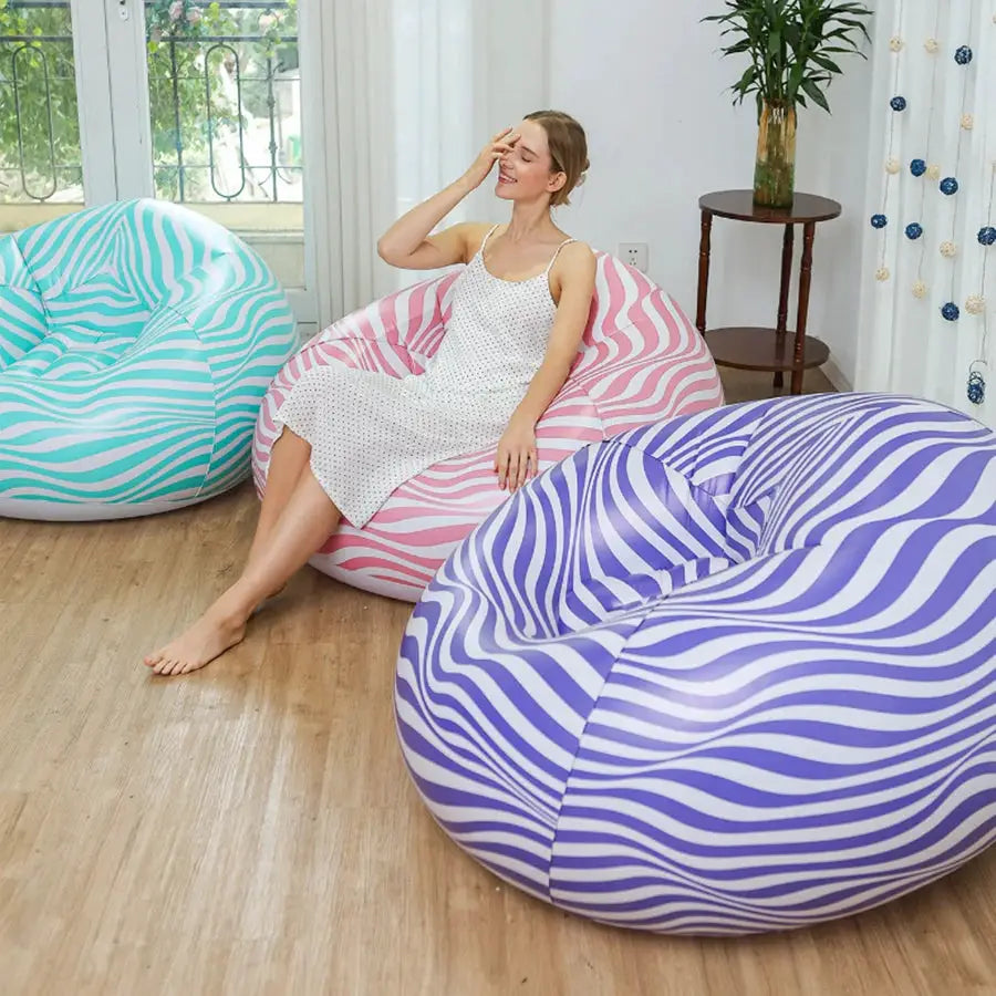 Large PVC inflatable sofa chairs with zebra-striped teal blue, pink, and purple; Simples Market loungers