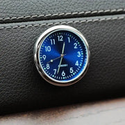 Car clock ornament by Simples Market; round blue-dial quartz dashboard clock with silver bezel