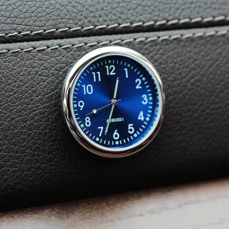 Car clock ornament by Simples Market; round blue-dial quartz dashboard clock with silver bezel