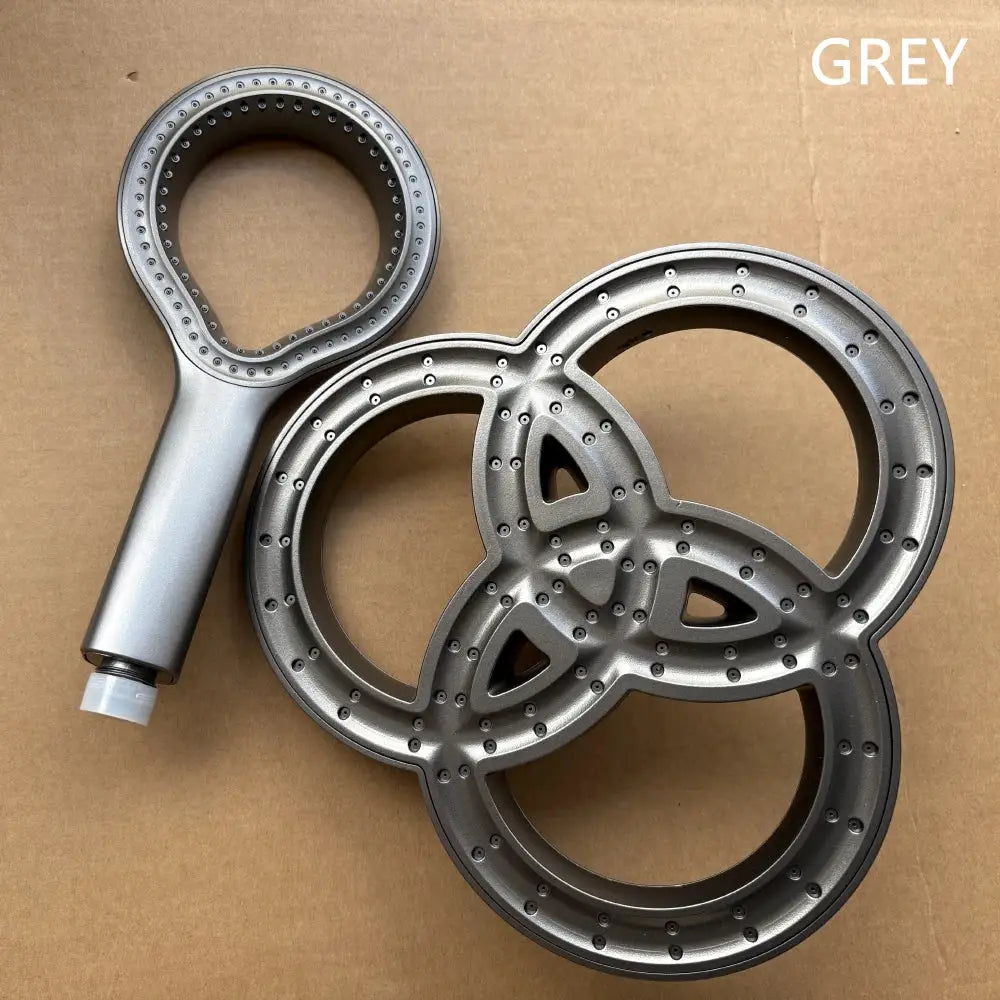 Grey high-pressure rainfall shower head set with three interlocking rings and handheld head