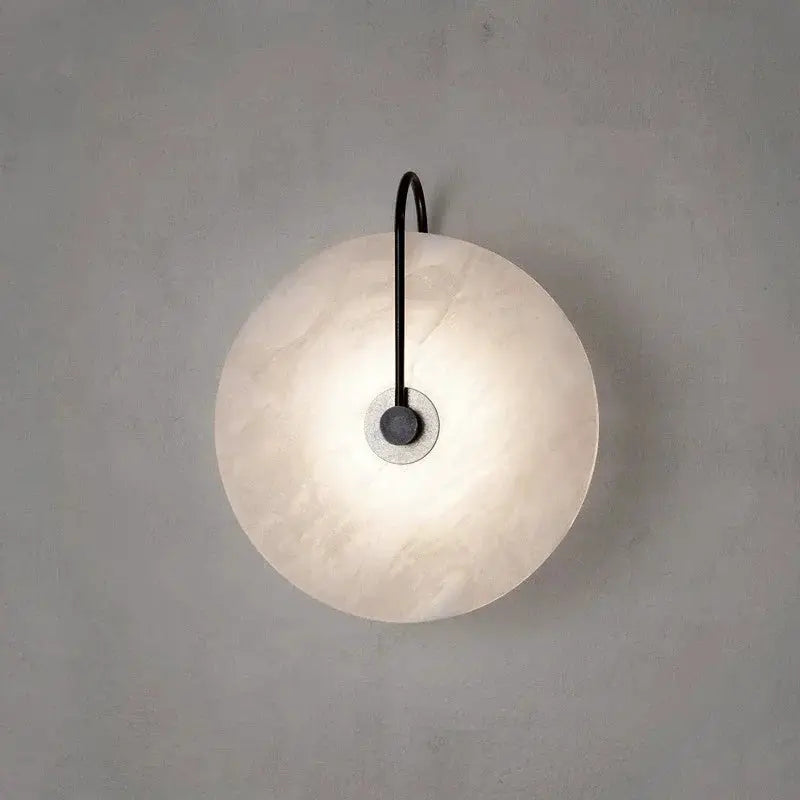 Marble Moon Nordic wall sconce with round white marble disk and LED light by Simples Market, modern bedside lamp