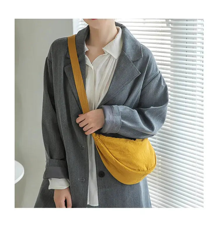 Crossbody bag in mustard yellow nylon with padded design for women