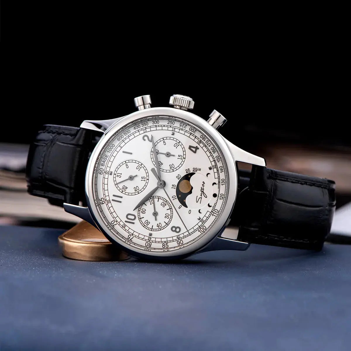 Sugess men's chronograph watch with moonphase, white dial, stainless steel case, black leather strap