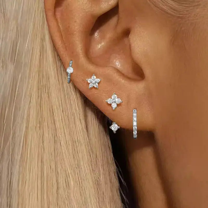 4pc zircon earring set for women by Simples Market; silver-tone hoops and flower stud/huggie earrings.