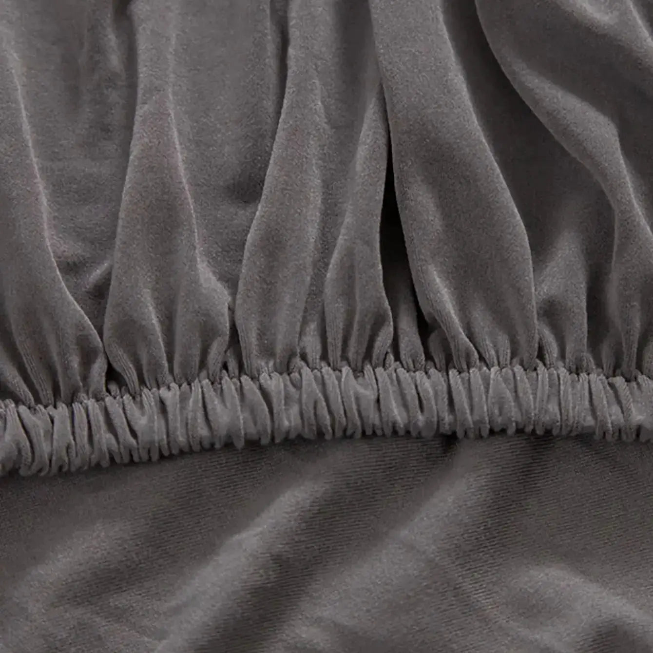 Sofa cushion cover in gray velvet-like fabric with elastic edge