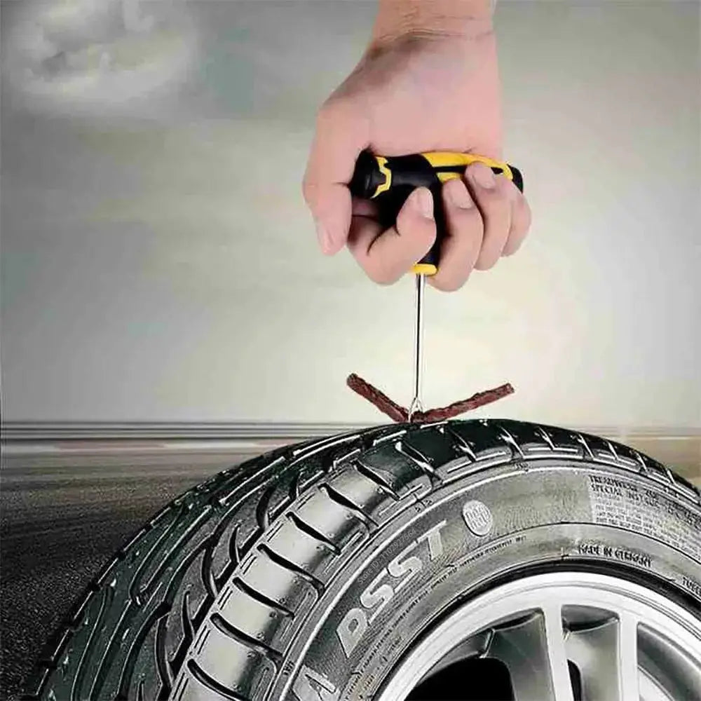 Simples Market tire repair kit with black and yellow handle, used to insert puncture plugs into a tubeless car tire