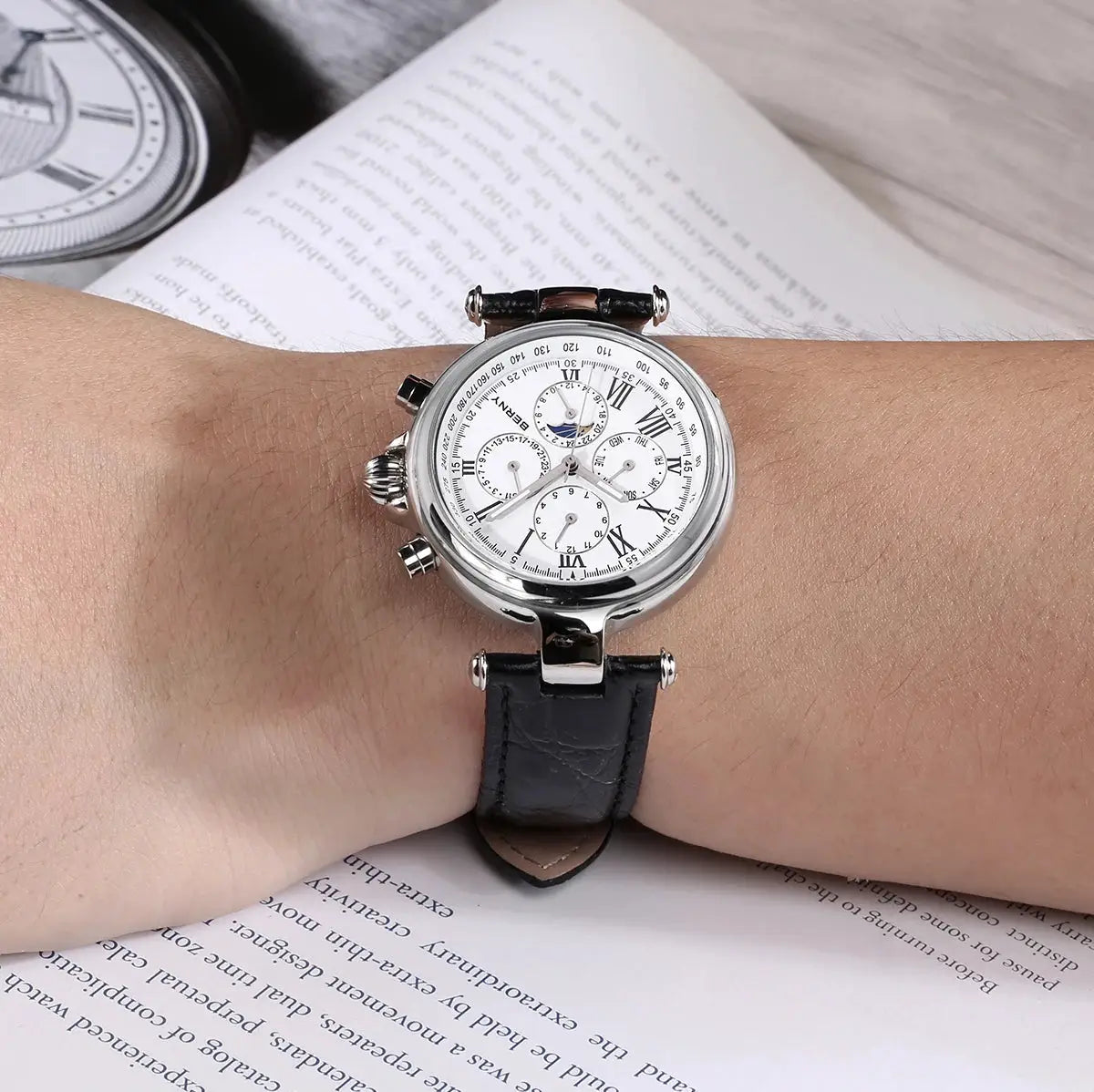 BERNY retro automatic men's watch with sun and moon phase, Roman numerals, silver case, black leather strap