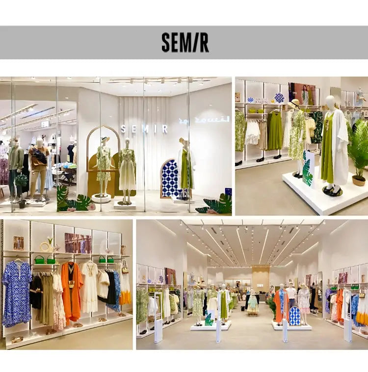Semir men's down jacket store display in a bright showroom with mannequins and apparel