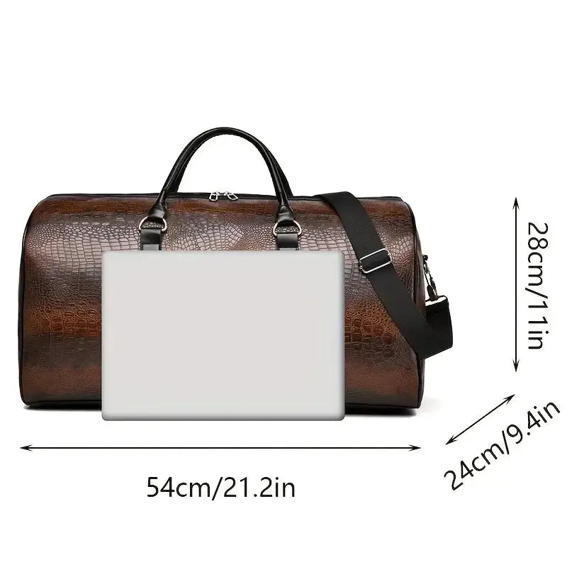 Large-capacity brown crocodile-textured travel duffel bag with black handles and detachable strap; laptop shown for scale.