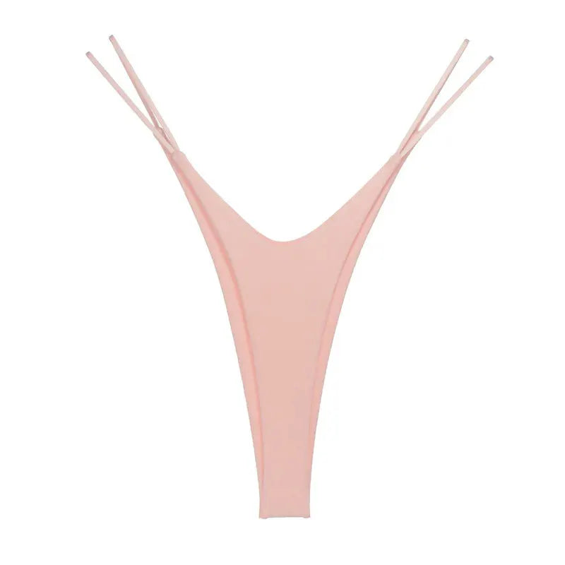 Pink cotton thong by Simples Market, high-cut seamless design with double-strap sides.