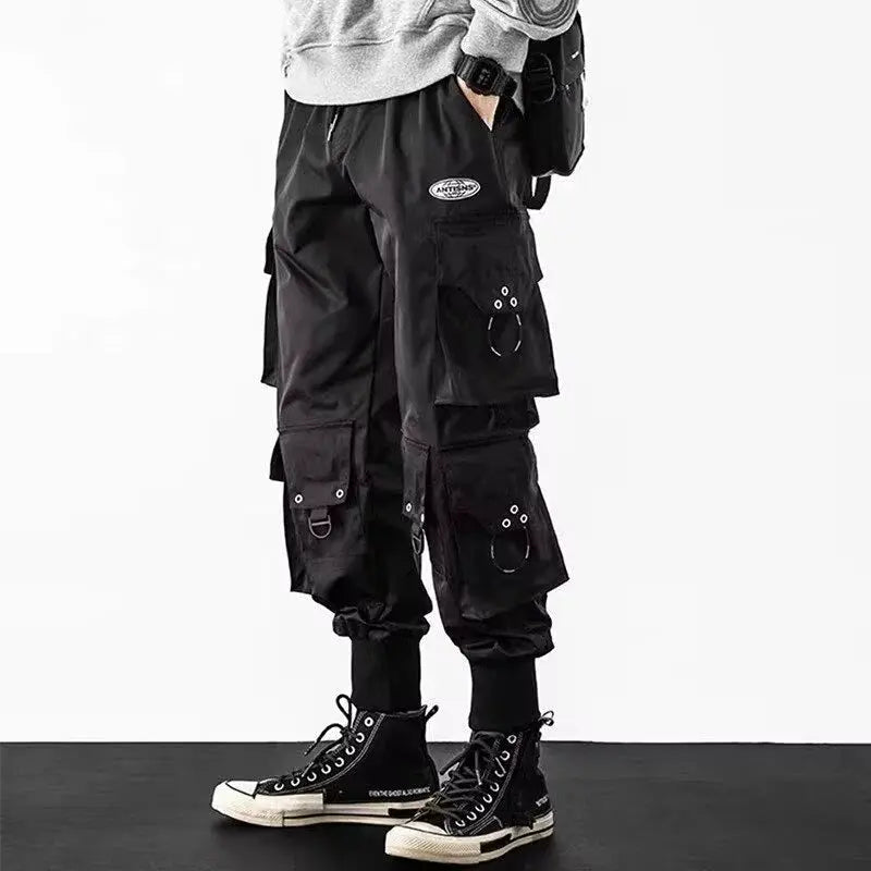 Men's black cargo pants by Simples Market, quick-dry ice-silk fabric, multiple pockets.