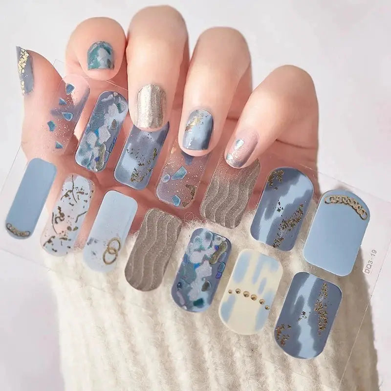 Full-cover nail stickers by Simples Market; blue and silver foil designs with glitter, self-adhesive manicure decals
