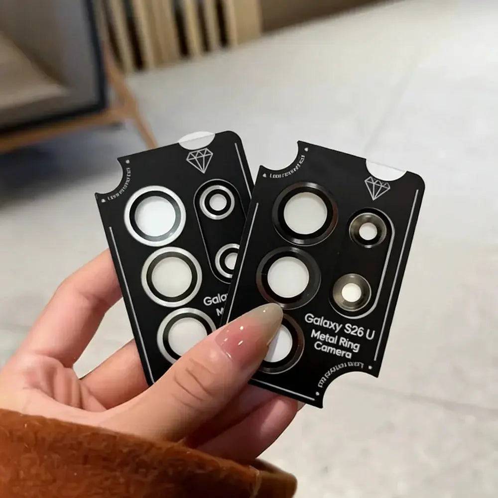Two black camera lens ring cards for Samsung Galaxy phones, metal rings with white inner circles.