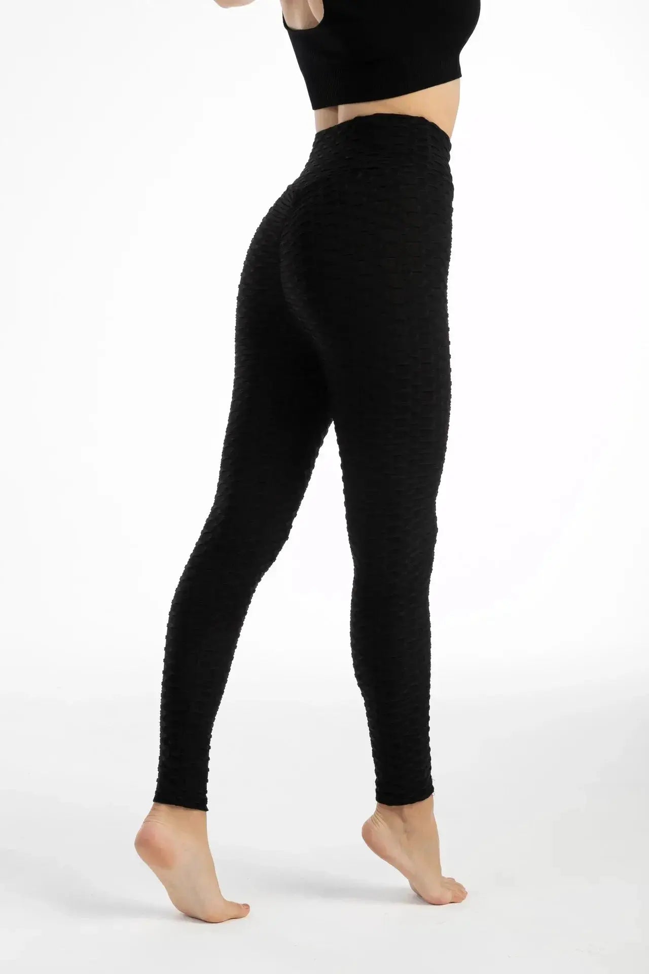Women black high-waist bubble leggings with textured seamless fabric for yoga and gym Simples Market