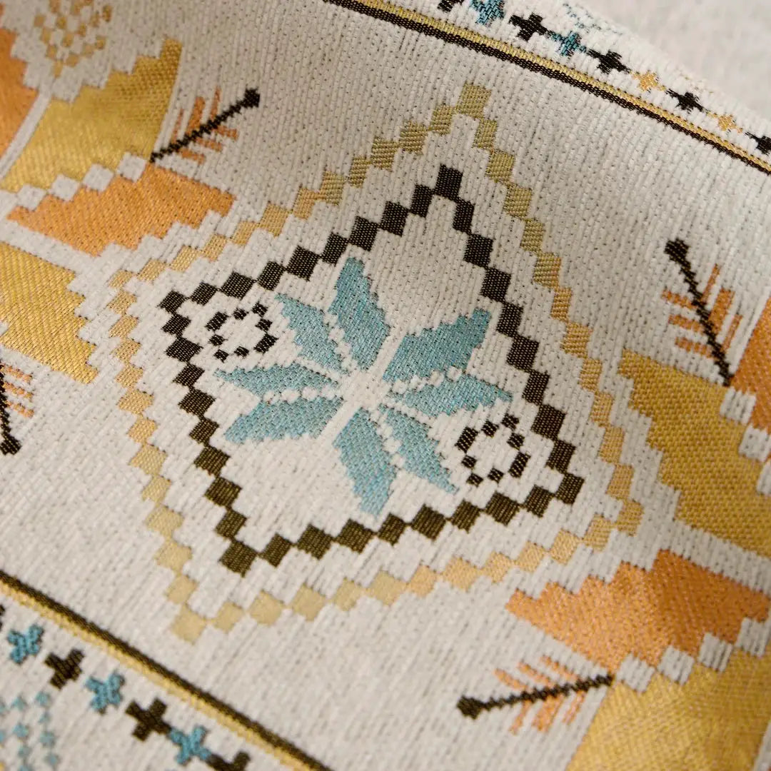 Bohemian jacquard chenille sofa cover in beige with teal and mustard geometric pattern