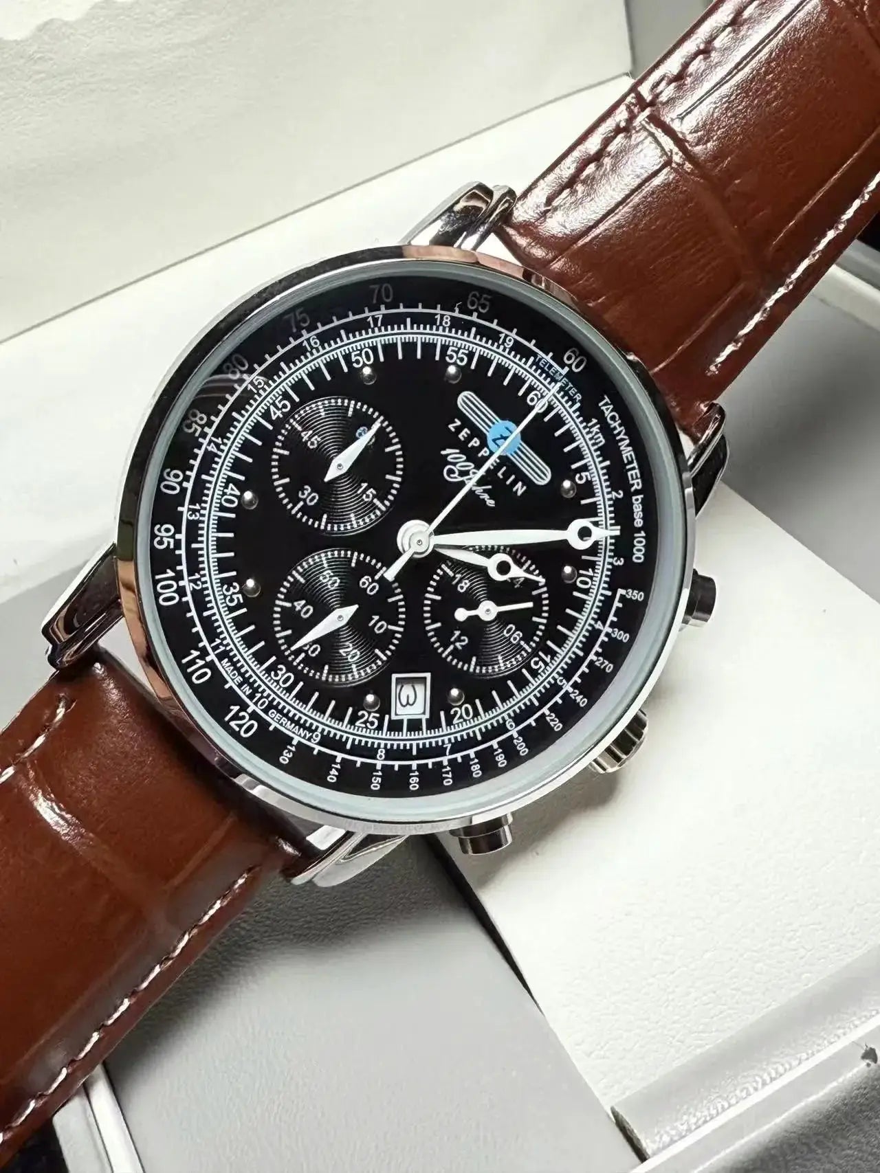 Zeppelin Airship automatic men's watch with black dial, brown leather strap, silver case