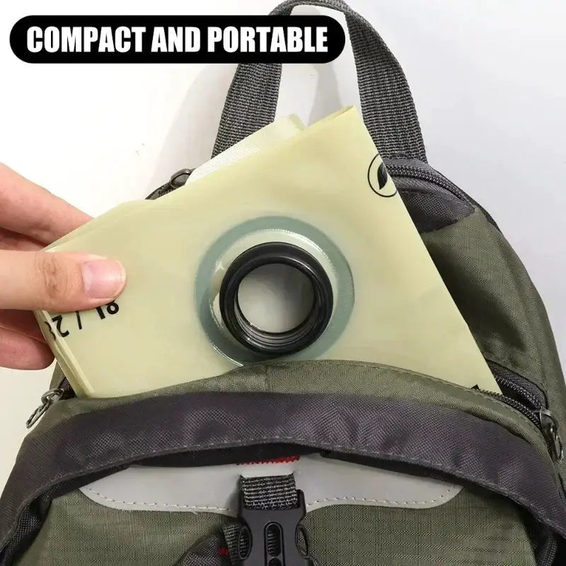 Collapsible water container bag, 5L/10L, pale yellow with black cap, shown in a green backpack