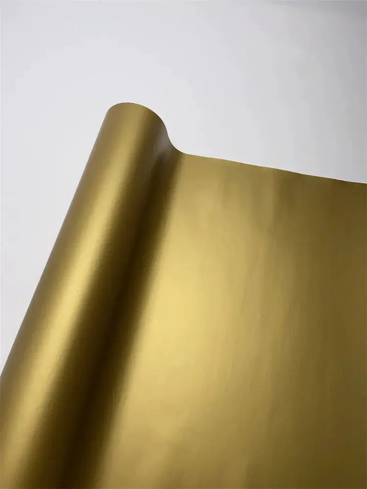 Matte gold wrap vinyl film by Simples Market with air-release channels for DIY car decals