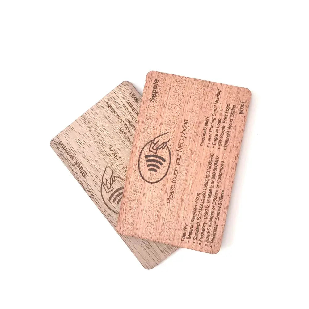 2 wooden NFC cards by Simples Market with laser-engraved text