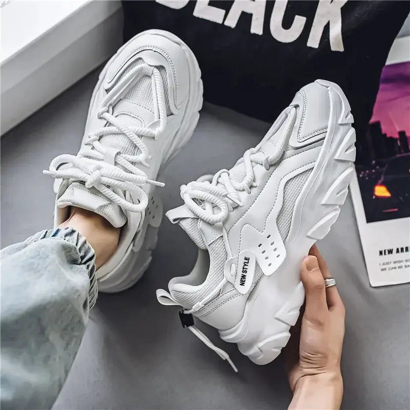 Men's white breathable sneakers with a thick chunky sole and mesh panels
