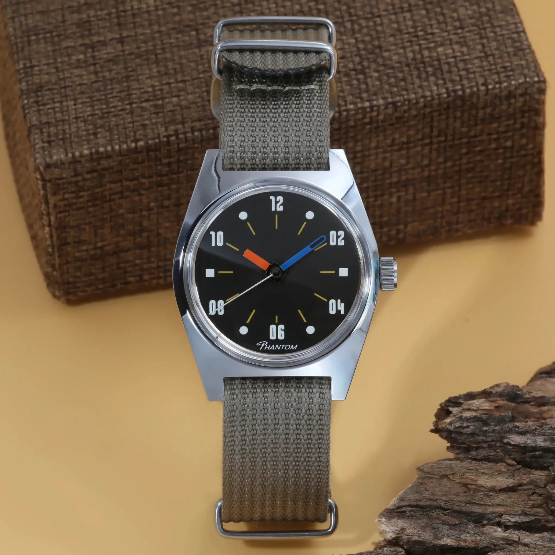 Simples Market 7120 hand-wind mechanical men’s watch, 36mm, black dial with color-coded hands, gray fabric strap