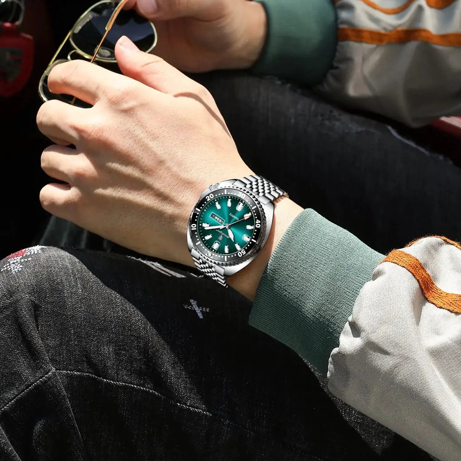 POEDAGAR luxury men's stainless steel wristwatch with green dial, date window, luminous markers