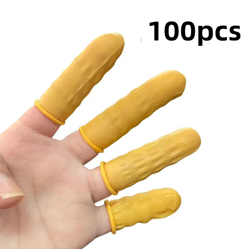 Disposable fingertip protectors in yellow latex, worn on four fingers